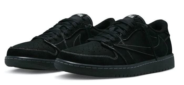 Black Travis Scott shoes.